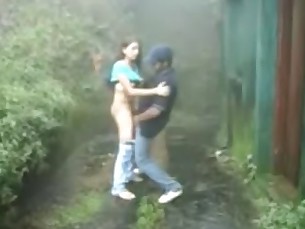 www.indiangirls.tk Indian girl sucking and fucking outdoors in rain