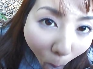 Hungry hungry Japanese whore eats a hairy cock in public